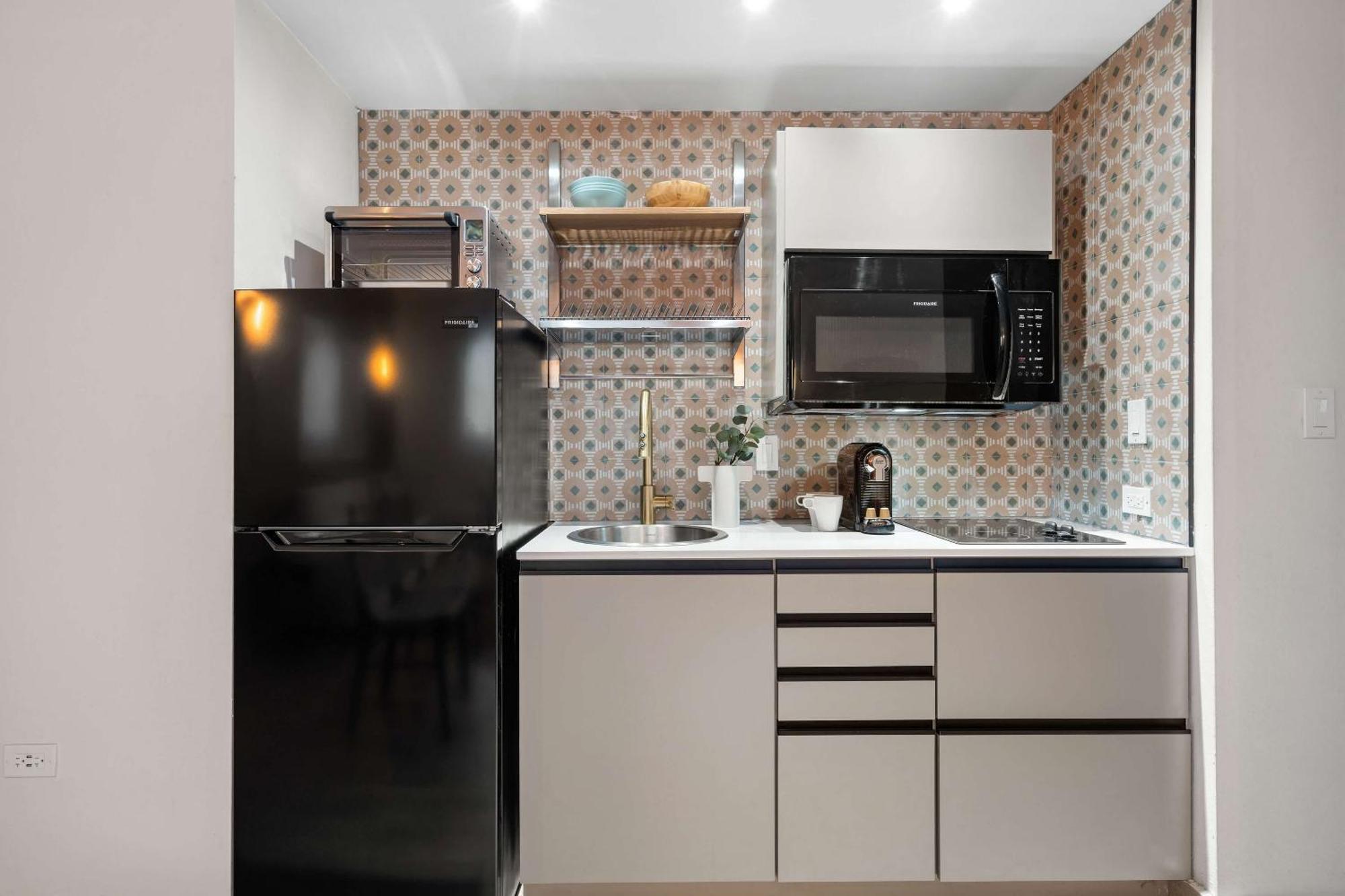 Hibird- Apartment And Suites Hotel 산후안 객실 사진